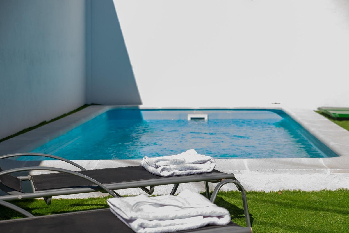 5 Bed Townhouse for sale in Nueva Andalucía Costa Del Sol, Málaga, Spain